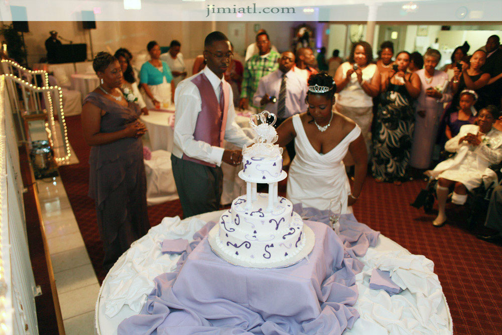 Just Married Couple Cut Cake