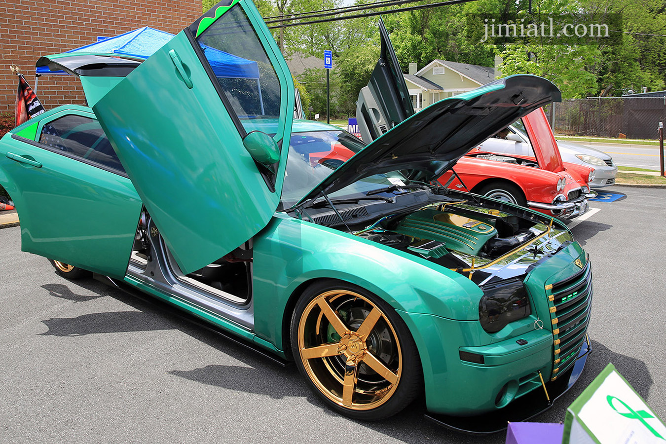 Dodge car with Lamborghini doors at downtown Lawrenceville car show.