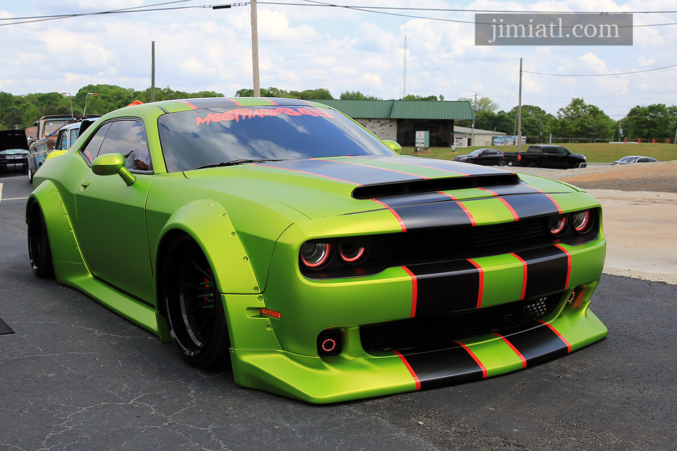 Sporty black and green Dodge Charger at car show in Downtown Lawrenceville