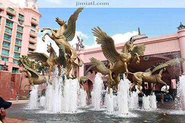 Horse statues within a water fountain in front of Atlantis Hotel. The grand entrance has been kept up well.